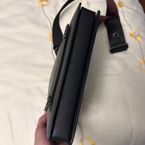 Faire Collective  Men’s Clutch and Shoulder Bag.